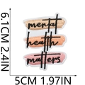 Macro view of 'Mental Health Matters' rectangular embroidered patch with detailed stitching - Mental Health Matters Text Style