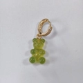 Grass green gummy bear earring with gold rhinestone hoop on a clean white surface - Transparent Grass Green