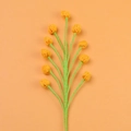 Detail of yellow hand-knitted flower buds with green stems on an orange background - Sheng Tang - Snow Fruit Bouquet (orange)