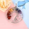 Macro detail of Tree of Life pendant with colorful seven chakra natural crystal stones - 5cm Silver Bent Root