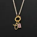14K gold plated stainless steel necklace with pink crystal and letter O charm - Letter O