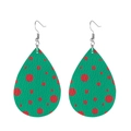 Detail of teardrop leather earrings with red polka dots on green and silver fish hooks - Green Base Red Polka Dots