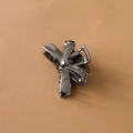 Metallic dark grey butterfly hair claw clip with glossy finish on leather background - Bowknot Ribbon / Black