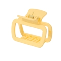 Detail view of large matte yellow square hair claw clip with strong metal spring - Yellow