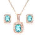 Macro detail of rose gold jewelry set featuring rectangular aquamarine stones and diamonds - Rose Gold + Aquamarine Blue Set