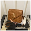 Detail of caramel quilted leather cross-body bag with golden fringe tassel ornament - Dark Brown