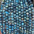 Polished blue sea sediment jasper round beads with unique natural stone textures - Dark Blue