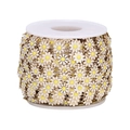 Close-up of 10mm stainless steel daisy flower chain rolls with white petals and gold links - 10mm Width * 1 Meter / White