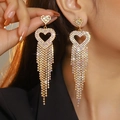 Sparkling gold heart earrings with long fringe tassels shown on model for festive occasions - Gold Heart Colorful Long Tassel Style (DTE1816403GL-WAB)