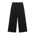Dettaglio di pantaloni neri a gamba larga a costine con vita elastica su sfondo bianco - S / Pantaloni Neri