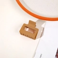 Matte khaki square hair claw clip for women displayed on a lifestyle background - Matte Ginger