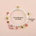 White pearl pet collar with golden bell and strawberry charm for cats and small dogs - One Size / Heart