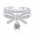 Silver bow-shaped ring with sparkling crystals and hanging round diamond in high detail - Bow with Round Zirconia Drop / Platinum Color-J339