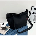 Detail of black canvas tote bag showing large capacity and street style design - Without Pendant / Black