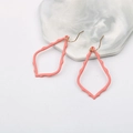 Pink matte teardrop earrings with golden hooks on white marble, elegant design - Pink