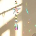 Detailed view of crescent moon and star suncatcher with colorful crystals and rainbow prisms - Colorful Pentagram