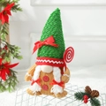 Handgefertigter Weihnachtswichtel mit grüner Strickmütze und roter Schleife für Deko - Grüne Hutpuppe