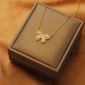 Elegant gold titanium steel necklace featuring a hollow butterfly pendant with zircon crystals - Zirconia Butterfly Necklace (XL1968-15)