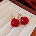 Macro shot of retro pearl earrings with red beads and zircon-inlaid gold metal detail - 51# Vintage Rhinestone Ear Clip / Gold/Red