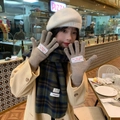 Beige knitted gloves with red script label shown on model with plaid scarf - M / Khaki