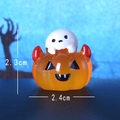 Luminous Halloween ghost sitting on an orange pumpkin figurine, size 2.4x2.3cm - Luminous Ghost on Pumpkin