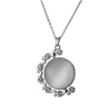 Silver celestial necklace featuring a rotating moon and star pendant with turquoise stone - White Cat Eye/Metal Chain