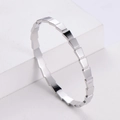 Bracciale argento geometrico moderno con chiusura lucida e design a blocchi - Color Acciaio