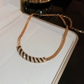 Vintage gold necklace featuring a black enamel and crystal curved pendant in a jewelry box - Gold-Black (Rhinestone Arch Pendant)
