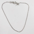 Close-up of minimalist silver paperclip chain with lobster clasp and adjustable bead detail - 1.0MM O-Chain / Silver