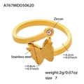 Detail view of gold stainless steel ring with zircon and matte butterfly decoration - Golden Butterfly Ring