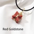 Handcrafted goldstone merkaba star pendant necklace with gold wire wrap on black cord - Red Goldstone