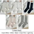 Five pairs of ballet-style hollow mesh crew socks with bow embroidery in various colors - 5 Pairs Set (Assorted Colors)