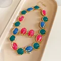 Parure de bijoux vintage avec collier doré et boucles d'oreilles en cabochon coloré - Or-Multicolore
