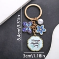 Golden Mother's Day keychain featuring blue butterfly charm and pearl bead accents - Blue (ER701)