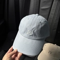 Macro detail of high-quality cotton baseball cap with white FD letter embroidery - Blue