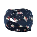 Close-up of dark blue paisley yoga headband with knot detail and floral prints - Dark Blue Background Red White Green Floral (28)