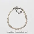 Weiße runde Perlenarmband mit verstellbarem Karabinerverschluss und Verlängerungskette 16cm - 4mm Armband