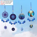 Set of 4 blue wind chimes with mandala and tree of life motifs hanging in blue sky - Painted All-Seeing Eye Life Tree (NO.17)