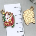 Christmas sleigh and snowman enamel charms shown with scale ruler for sizing - Sleigh (22x14mm)