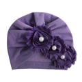 Detail of baby purple pleated turban hat featuring three fabric flowers with faux pearls - Purple