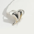 Polished silver heart ring with minimalist metal finish on white stone surface - Polished Gold Heart Earrings / Silver