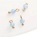 Set of four light blue 4mm cat eye stone faceted charms with golden rings for DIY jewelry - Aquamarine