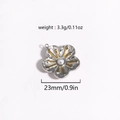 Macro view of a 23mm floral pendant with silver petals, gold accents, and a white pearl - Silver Pearl Flower (Style 7)