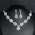 Luxurious silver bridal jewelry set with sparkling water-drop crystals on a black stand - Pear-Shaped Clear Zirconia Style (DTN14027245S)