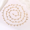 Macro shot of long gold chain with star pendants and rhinestones on white fabric - Solid Star Turtle Claw Chain (Style 16) / Length approx. 1m