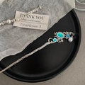 Silver crescent moon hair pin with blue gemstone and a matching pearl bracelet - Moonstone
