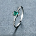 Elegant silver ring featuring square green topaz and vintage diamond-pave accents - Platinum Plated Green Zirconia