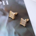 Close-up of square gold-plated stud earrings featuring pave-set sparkling zircons - D9 Gold Retro Square