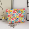 Quilted cotton makeup bag with colorful cartoon prints in a cozy lifestyle setting - Graffiti