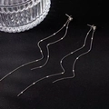 Boucles d'oreilles pendantes à pompon long en argent avec strass brillants pour femme - Argenté